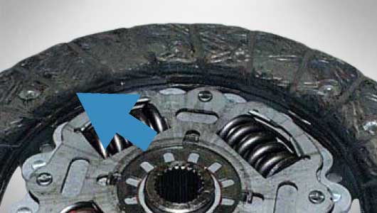 Clutch disc facings contaminated with oil or grease